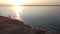 Beautiful sunrise with Asian fisherman bank fishing at Lavon Lake, Texas, America