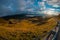 Beautiful sunrise on the Jaufenpass or Passo Giovo in northern italy with beautiful road winding on the mountain and sun just