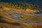 Beautiful sunrise on the Jaufenpass or Passo Giovo in northern italy with beautiful road winding on the mountain and sun just