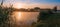 Beautiful sunrise at lake surrounded by forest in KrasnobrÃ³d, Roztocze, Poland