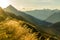 Beautiful sunrise and layered mountain silhouettes in early morning. Lechtal and Allgau Alps, Bavaria and Austria.