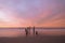 Beautiful sunrise of old jetty piles at St. Clair Beach in Dunedin, New Zealand