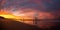 Beautiful sunrise of old jetty piles at St. Clair Beach in Dunedin, New Zealand