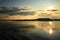 Beautiful sunrise over the ocean with sunlight shining over the clouds, Sognefjord, the countryâ€™s longest and deepest fjord.