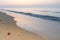 Beautiful sunrise reflections on beach