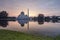 Beautiful sunrise scenery of As-Salam Mosque located in Selangor, Malaysia with reflecton on the lake