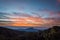 Beautiful sunrise sky and mist green mountain scenery, Doi Intanon ,Thailand with orange clouds