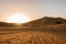 Beautiful sunrise view of the Erg Chebbi dunes, Sahara Desert, Merzouga, Morocco in Africa