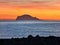 Beautiful sunrise withe the Panarea island seen from the Salina island in the Aeolian islands, Sicily, Italy