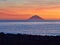 Beautiful sunrise withe the Stromboli island seen from the Salina island in the Aeolian islands, Sicily, Italy