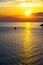 Beautiful sunser on the sea with yellow sun on the horizont. Holiday concept image with sunset.