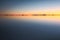 Beautiful sunset and afterglow reflection Uyuni salt flats 