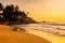 Beautiful sunset on the beach with palms on a Philippines