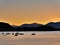 Beautiful sunset, boats in harbour, mountains beyond, Oban, Scotland
