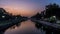 Beautiful sunset Bucharest Romania Bucuresti Dambovita river landscape reflection