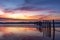 A beautiful sunset with cloud reflections at moana beach with th