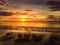 Beautiful sunset colors over the coastline of Allerdale district in Cumbria, UK. Sun setting over the shore of Allonby bay on