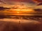 Beautiful sunset colors over the coastline of Allerdale district in Cumbria, UK. Sun setting over the shore of Allonby bay on