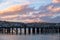 Beautiful sunset at the dock. Blue sky and Ocean with town view. Omaru, New Zealand