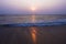 Beautiful sunset at dusk in Anjuna beach Goa India