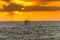 Beautiful sunset and golden twilight, and clouds and a longly cruise ship sailing on the Mediterranean Sea in Tel Aviv, Israel