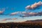 Beautiful sunset illuminates clouds over the Sangre de Cristo Mountains near Taos, New Mexico