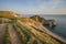 Beautiful sunset landscape image of Durdle Door