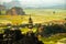 Beautiful sunset landscape viewpoint with white stupa from the top of Mua Cave mountain, Ninh Binh, Tam Coc, Vietnam