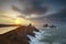 Beautiful sunset light on the cliffs of Liencres, Cantabria, Spain