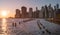 Beautiful Sunset and Lower Manhattan skyline with East River and New York City. Twilight with Reflections