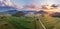 Beautiful sunset in mountains in Croatia. Bird`s eye view panorama of amazing sky and the red sun lights shooting clouds over