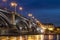 Beautiful sunset night over Rhine / Rhein river and old bridge i