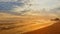 Beautiful Sunset at the ocean beach with sands and coral cliff