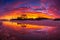 Beautiful sunset with orange clouds during summer at Campeche beach in Florianopolis Brazil