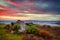 Beautiful sunset over the Atlantic Ocean with a small cottage house in Doolin, Co. Clare. Ireland