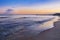 A beautiful sunset over the Baltic Sea, in the distance a pier in Gdynia. Poland