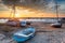 Beautiful sunset over boats on the beach at West Mersea