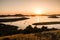 Beautiful sunset over the famous Kornati national park in Croatia, Europe, view from the top of the Zut island