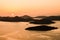 Beautiful sunset over the famous Kornati national park in Croatia, Europe, view from the top of the Zut island, sailboats on the