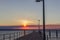 Beautiful sunset over jetty with of man laterns western australia