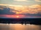 Beautiful sunset over Mississippi River with reflections in water