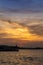 Beautiful sunset over the ocean at Sriracha town in Chonburi, Thailand showing colorful sky and dramatic cloud formations