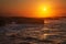 Beautiful sunset on Playa de las Catedrales during inflow, Spain