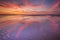 Beautiful sunset and reflections on the beach