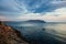 Beautiful sunset, rocks and sea in the evening