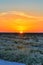 Beautiful sunset on salt lake Chott el Djerid, Sahara desert, Tu