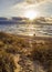 Beautiful sunset on the sandy beach and dunes of the Baltic Sea in Lithuania, Klaipeda