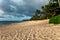 Beautiful sunset shoreline at tropical sandy beach in Oahu island