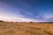 Beautiful sunset sky over calm countryside