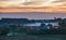 Beautiful sunset sky over calm countryside